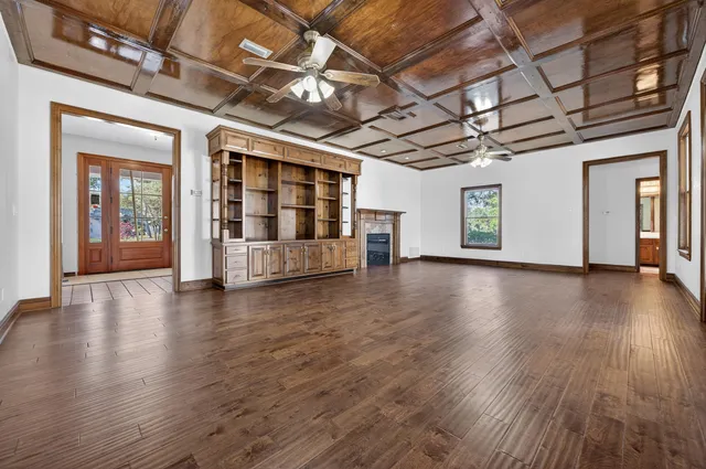 a kitchen with a refrigerator and a sink