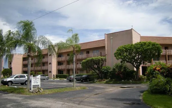 a front view of a building with street view