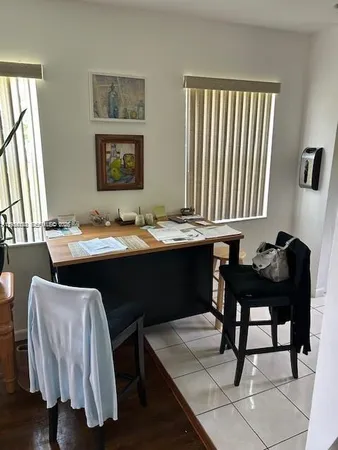 a view of a dining room with furniture