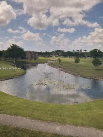 a view of a lake from a yard