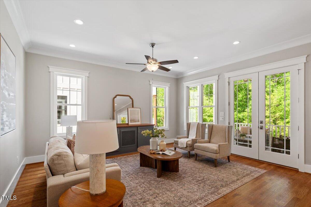 3932 Old Chapel Hill Road Durham, NC 27707 - Photo 5 of 46 a living room with furniture and a large window
