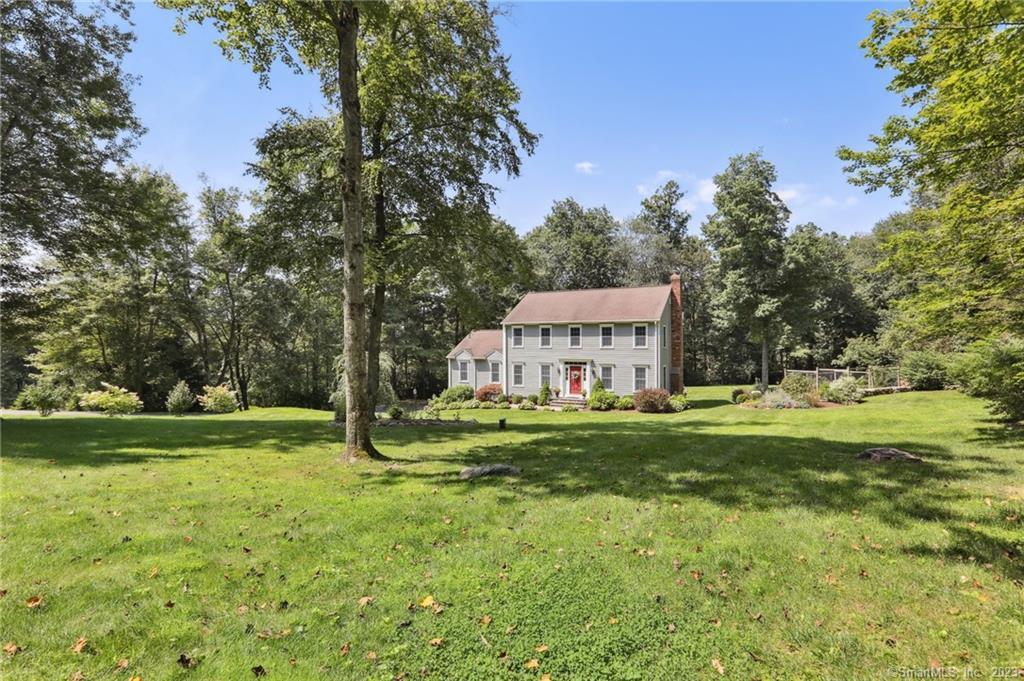 23 Wagon Wheel Road Redding, CT 06896 - Photo 1 of 1 a view of a house with a yard and sitting area