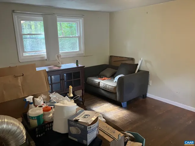 a living room with furniture and window