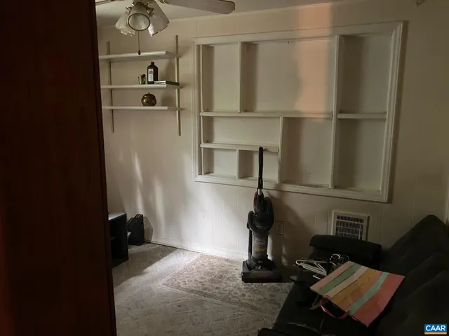 a kitchen with a stove and a window