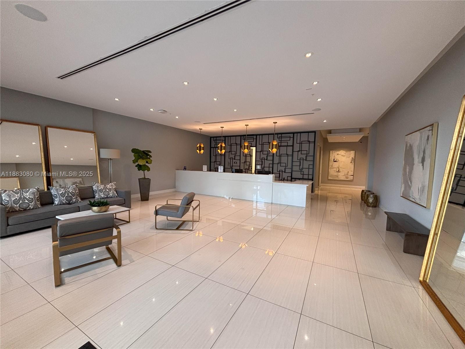 321 Northeast 26th Street, Unit 710 Miami, FL 33137 - Photo 8 of 21 a lobby with furniture and window