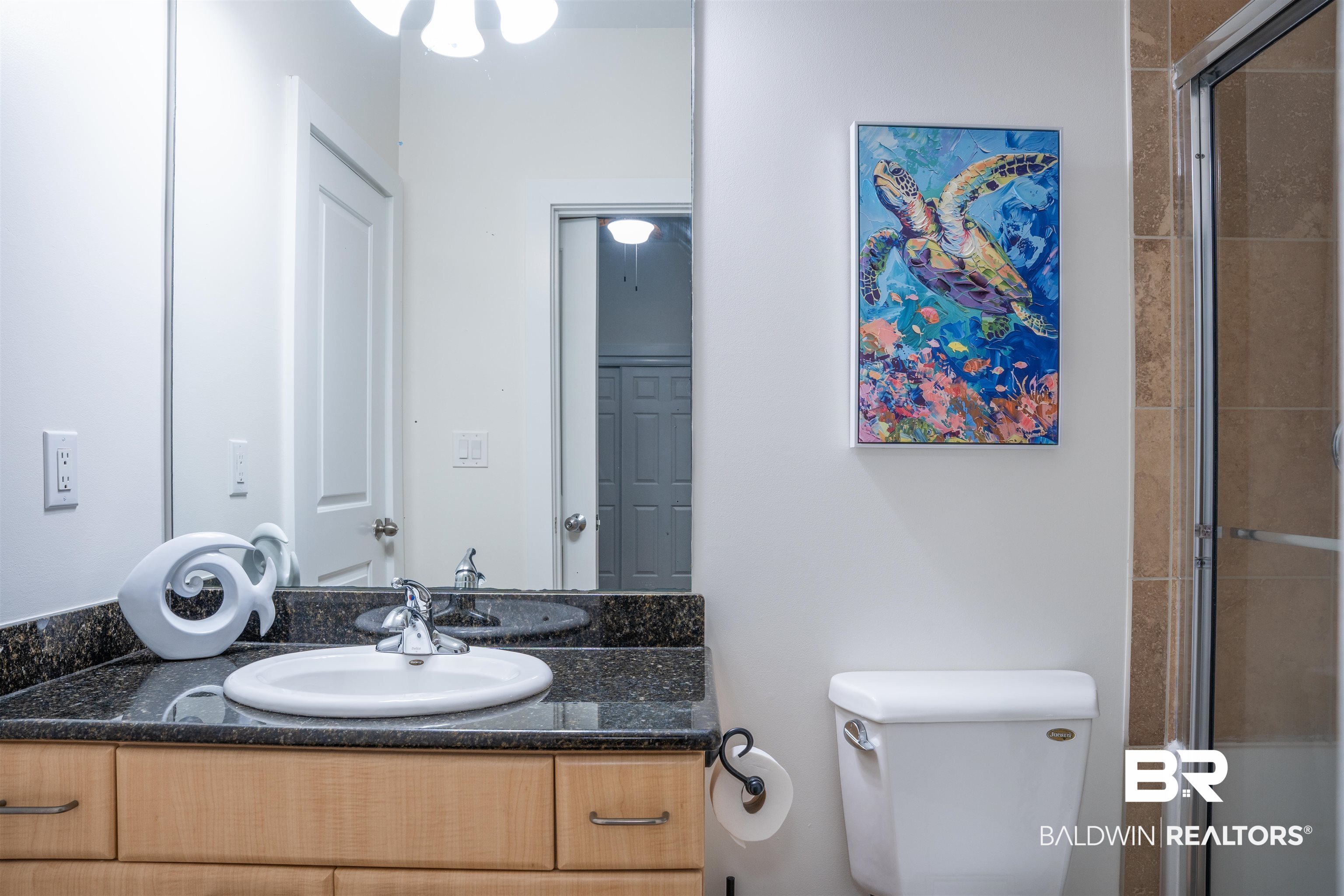 28107 Perdido Beach Boulevard, Unit DPH05 Orange Beach, AL 36561 - Photo 17 of 43 Bathroom featuring vanity and an enclosed shower
