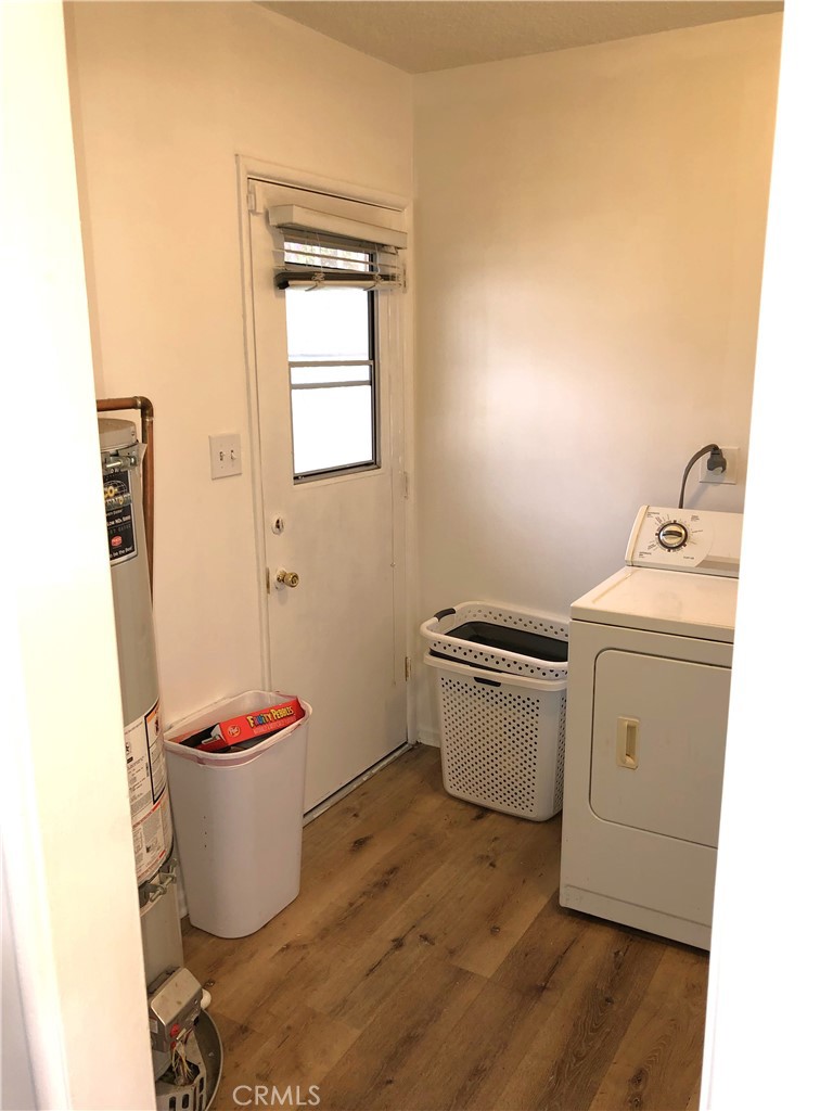 8808 Olive Street Bellflower, CA 90706 - Photo 31 of 42 Inside Laundry Room with Newer Water Heater
