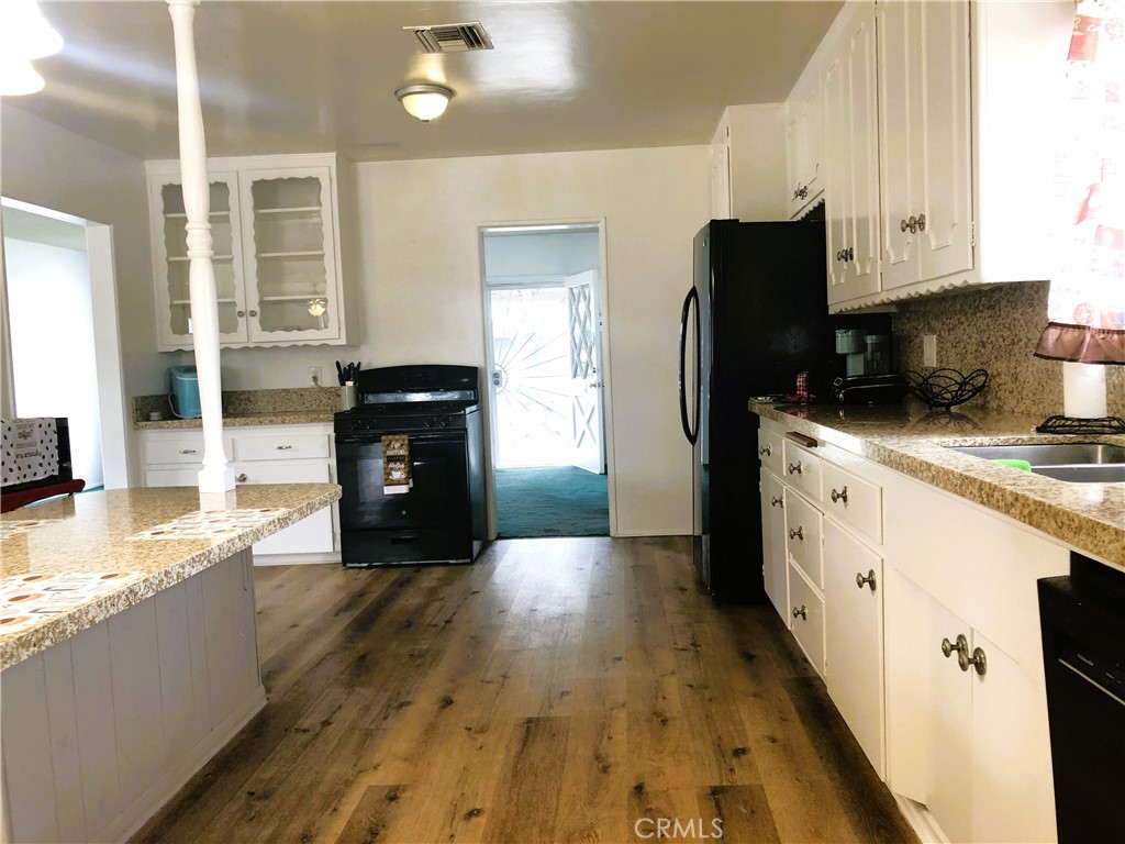 8808 Olive Street Bellflower, CA 90706 - Photo 10 of 42 Spacious Kitchen Area