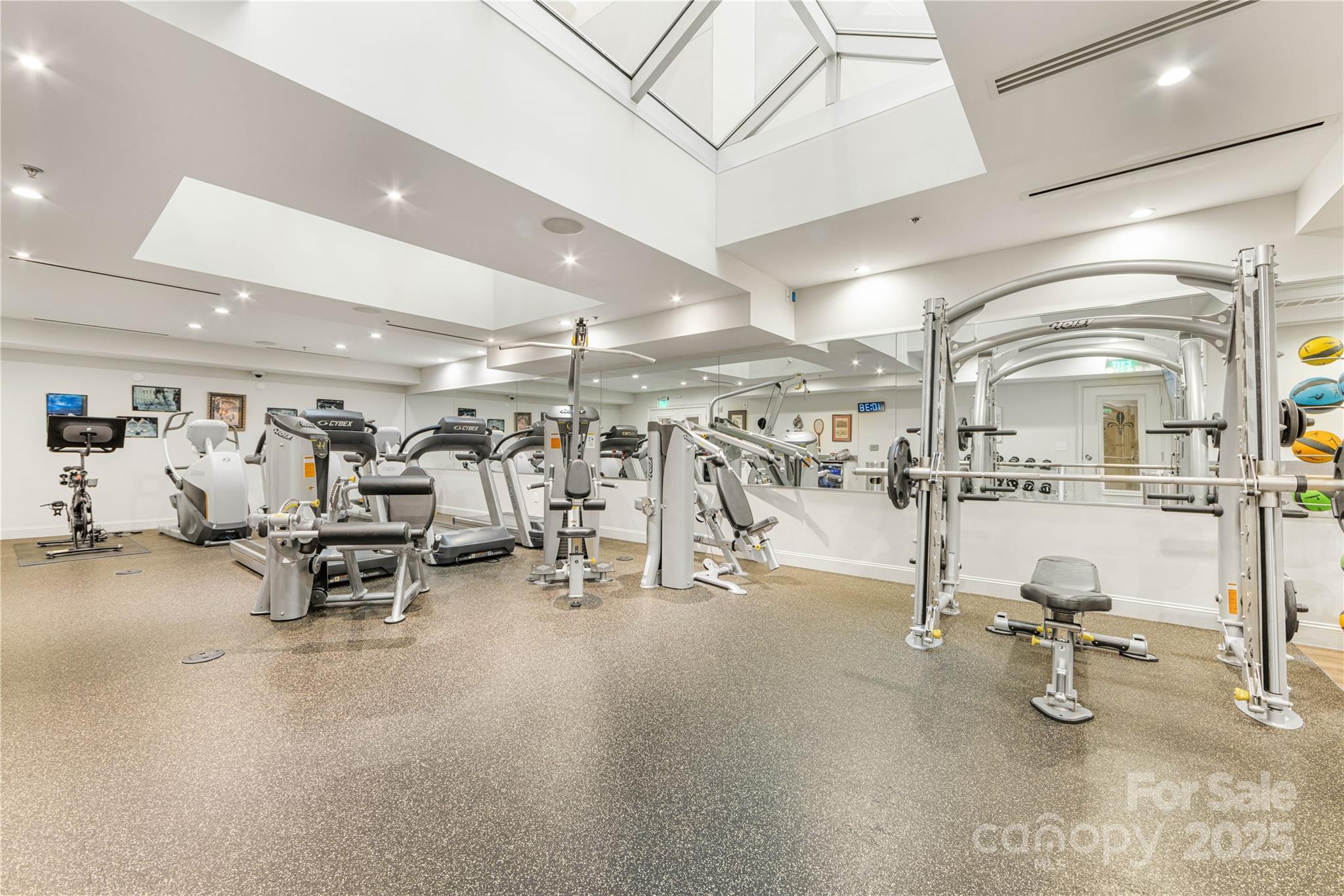 127 North Tryon Street, Unit 511 Charlotte, NC 28246 - Photo 29 of 32 a view of a room with gym equipment