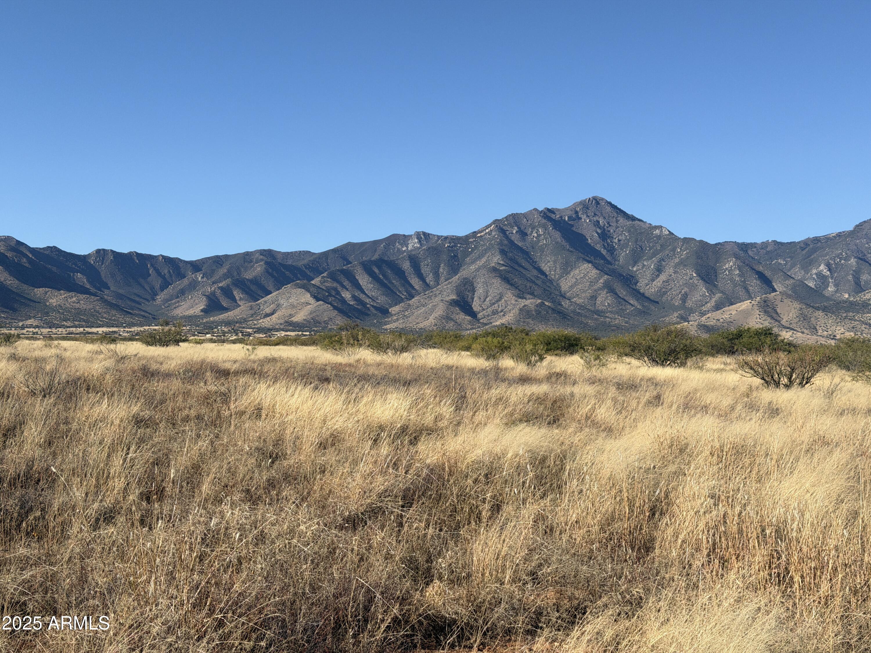 a view of a lake with mountains in the background