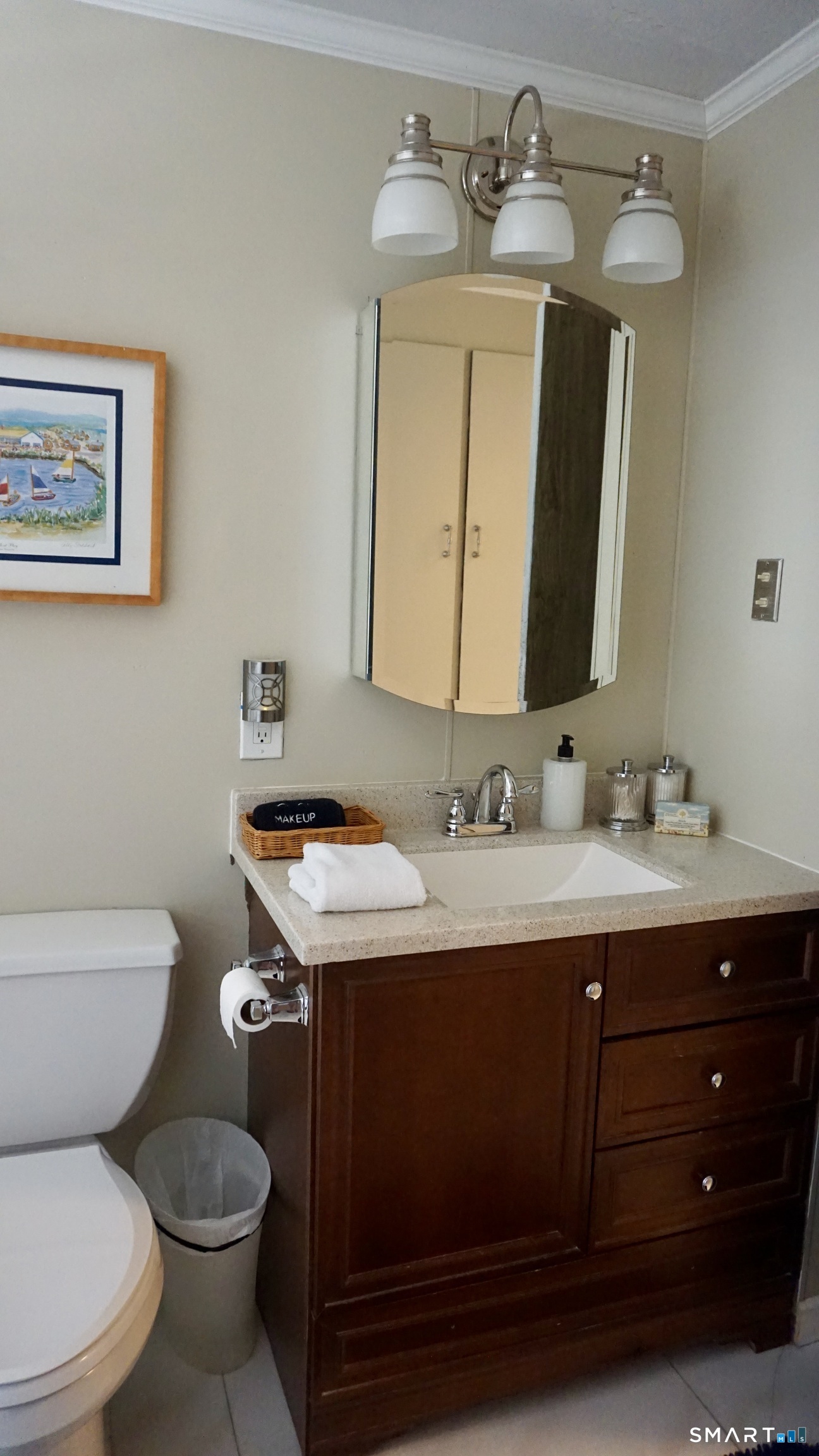 13 Pacific Street Groton, CT 06340 - Photo 29 of 31 a bathroom with a toilet sink and mirror