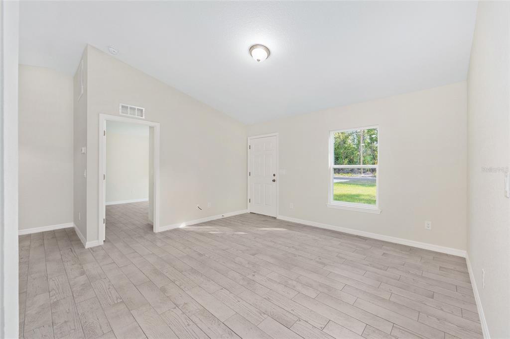 358 Locust Road Ocala, FL 34472 - Photo 13 of 48 an empty room with window