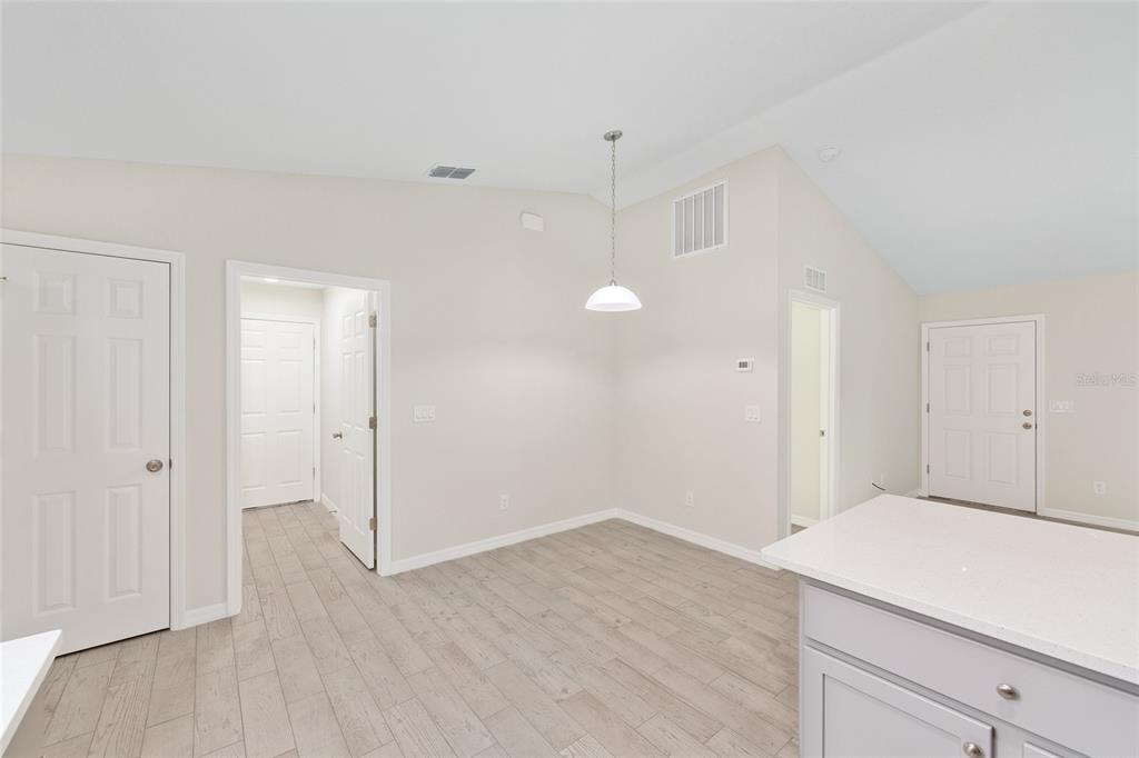 358 Locust Road Ocala, FL 34472 - Photo 21 of 48 a view of a room with wooden floor