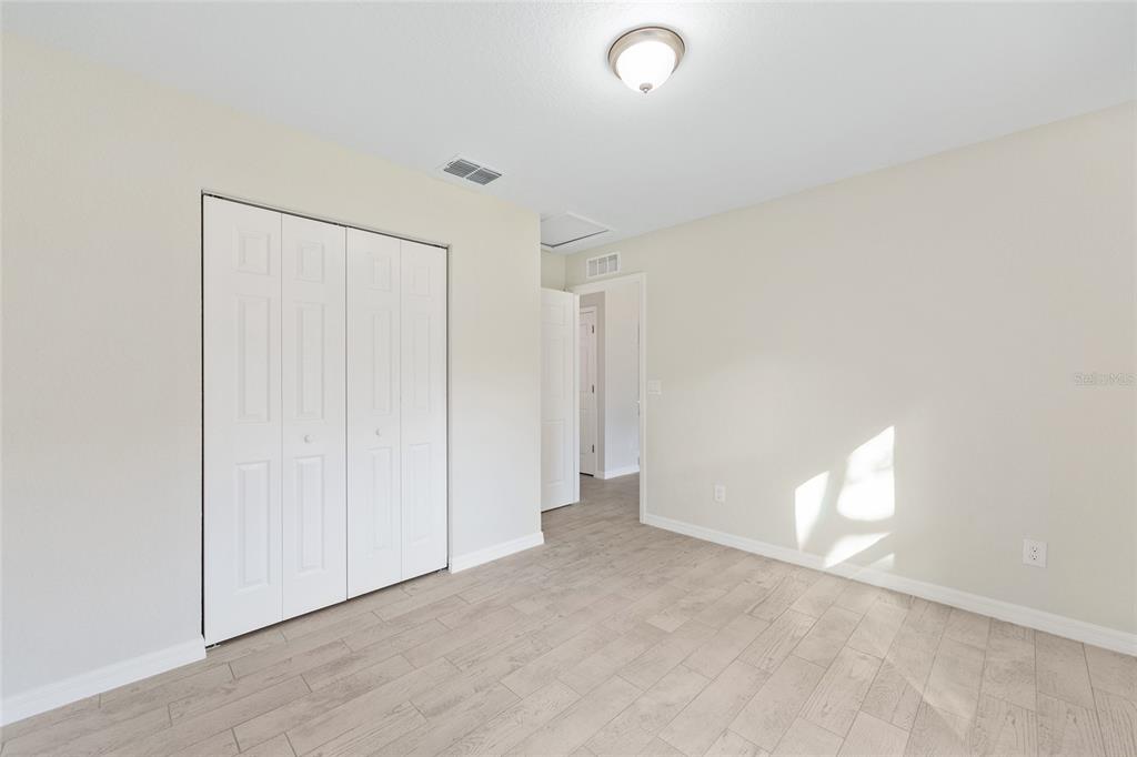 358 Locust Road Ocala, FL 34472 - Photo 26 of 48 an empty room with a empty space and a window