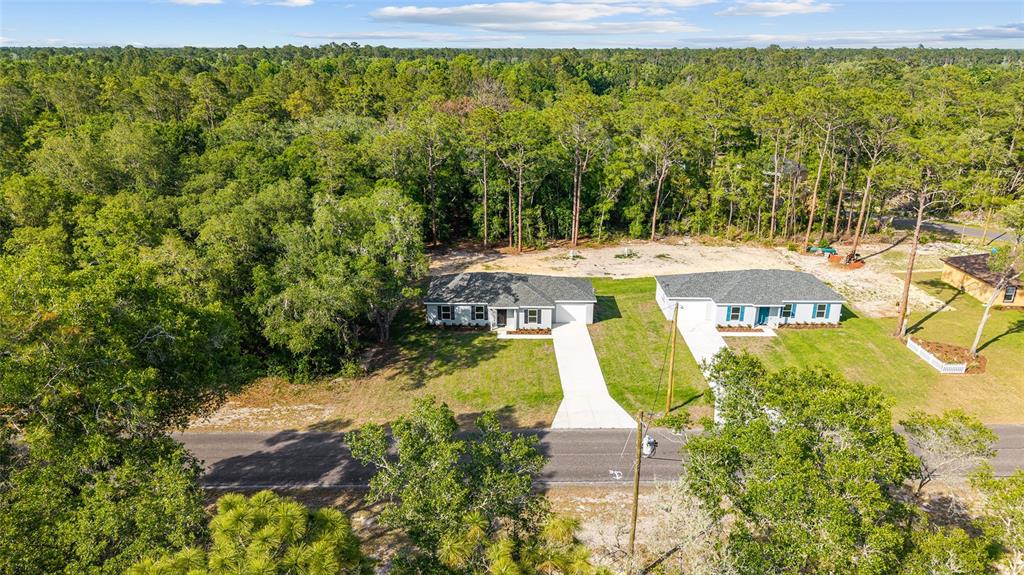 358 Locust Road Ocala, FL 34472 - Photo 33 of 48 a view of a swimming pool with a patio