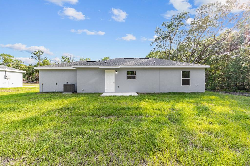 358 Locust Road Ocala, FL 34472 - Photo 7 of 48 a view of a house with a backyard
