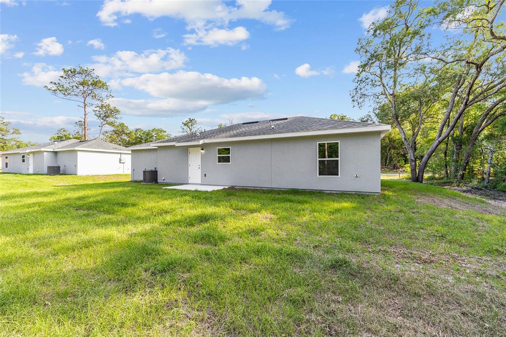358 Locust Road Ocala, FL 34472 - Photo 8 of 48 a view of a house with a backyard