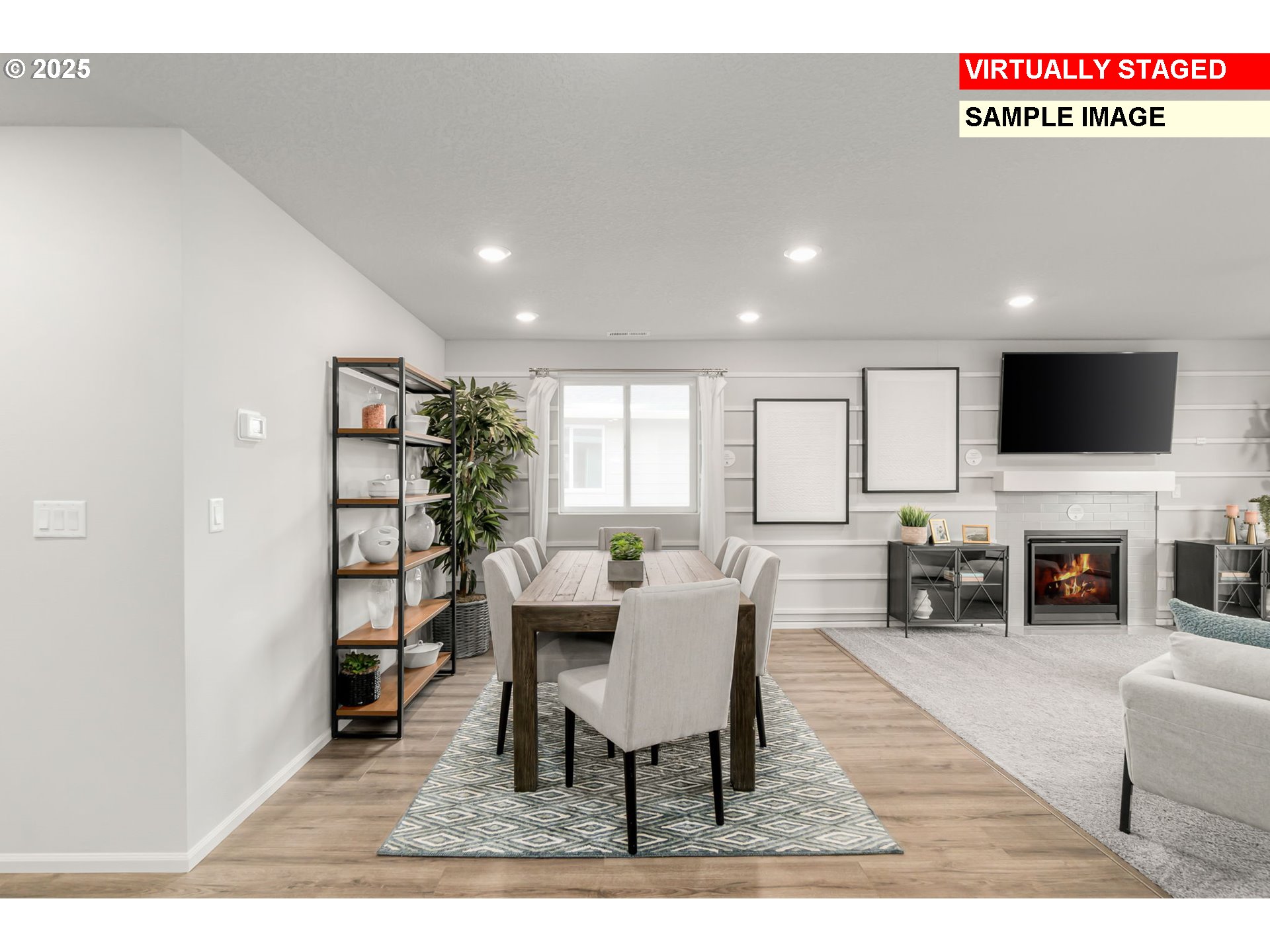 2961 Quail Avenue Gervais, OR 97026 - Photo 10 of 19 a living room with furniture a fireplace and a flat screen tv