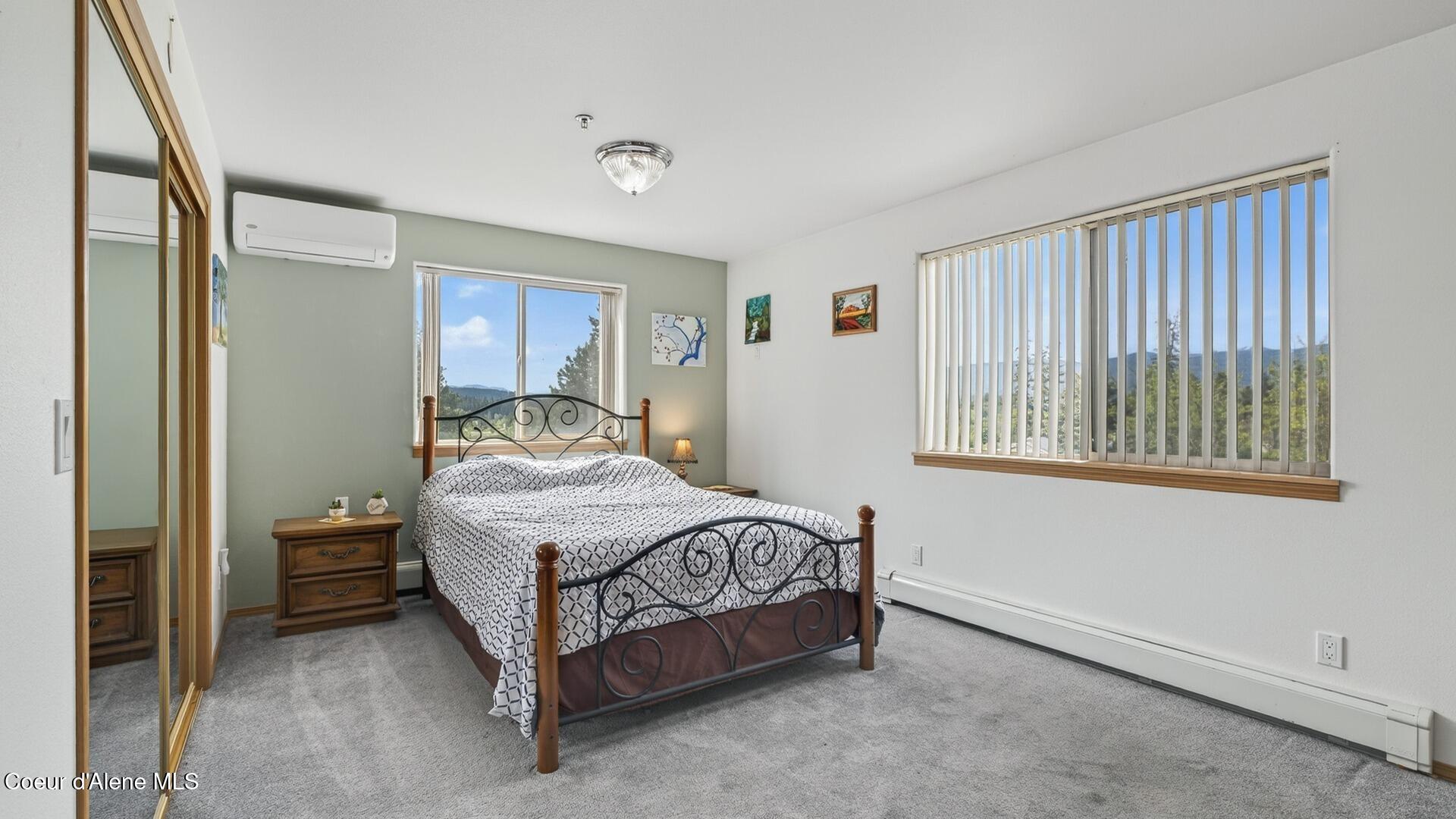 6616 Comanche Street Bonners Ferry, ID 83805 - Photo 39 of 59 041_Upper_Primary_Bedroom_2