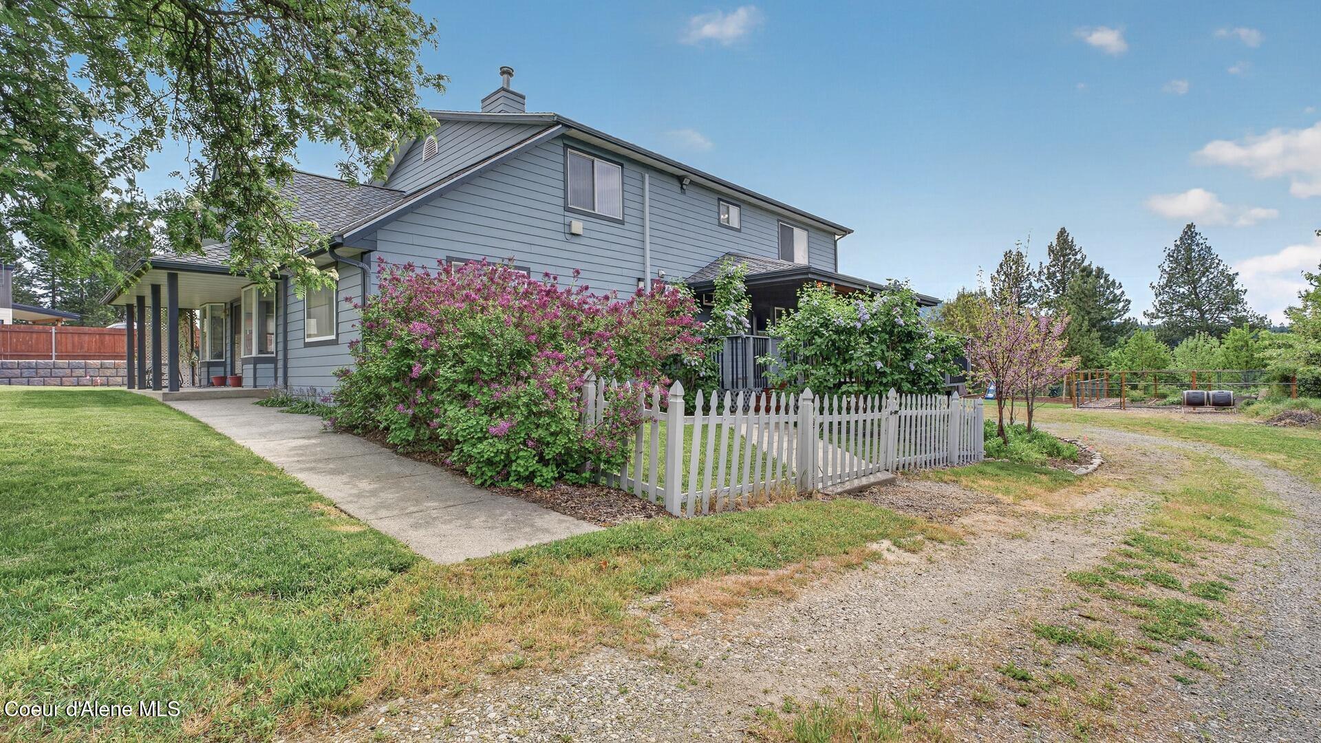 6616 Comanche Street Bonners Ferry, ID 83805 - Photo 50 of 59 052_Exterior_Side_Driveway