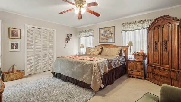 a bathroom with a sink vanity and a mirror