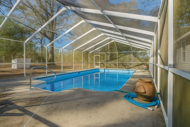 a kitchen with stainless steel appliances a stove a sink and a refrigerator