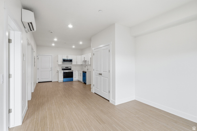 2085 North Main Street, Unit 301 Sunset, UT 84015 - Photo 6 of 20 Living room looking towardsfront door.