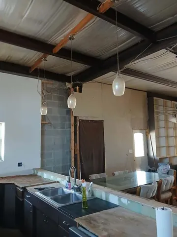 a bathroom with a toilet and a sink