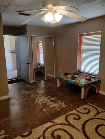 a view of a livingroom with furniture and window