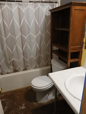 a small space with a hardwood and dryer