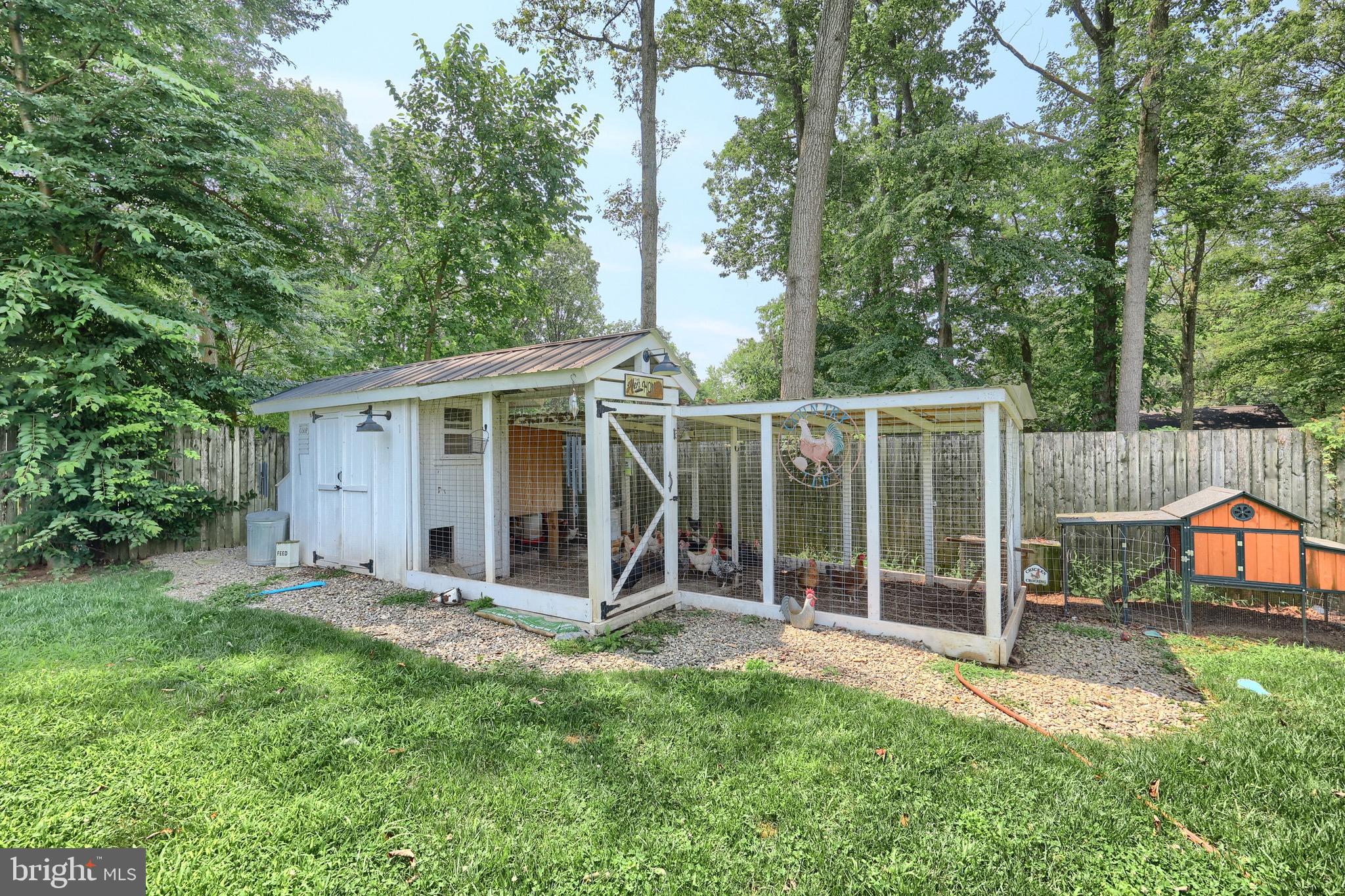 60 Massa Drive Windsor, PA 17366 - Photo 11 of 40 a view of a chair and table in backyard of the house