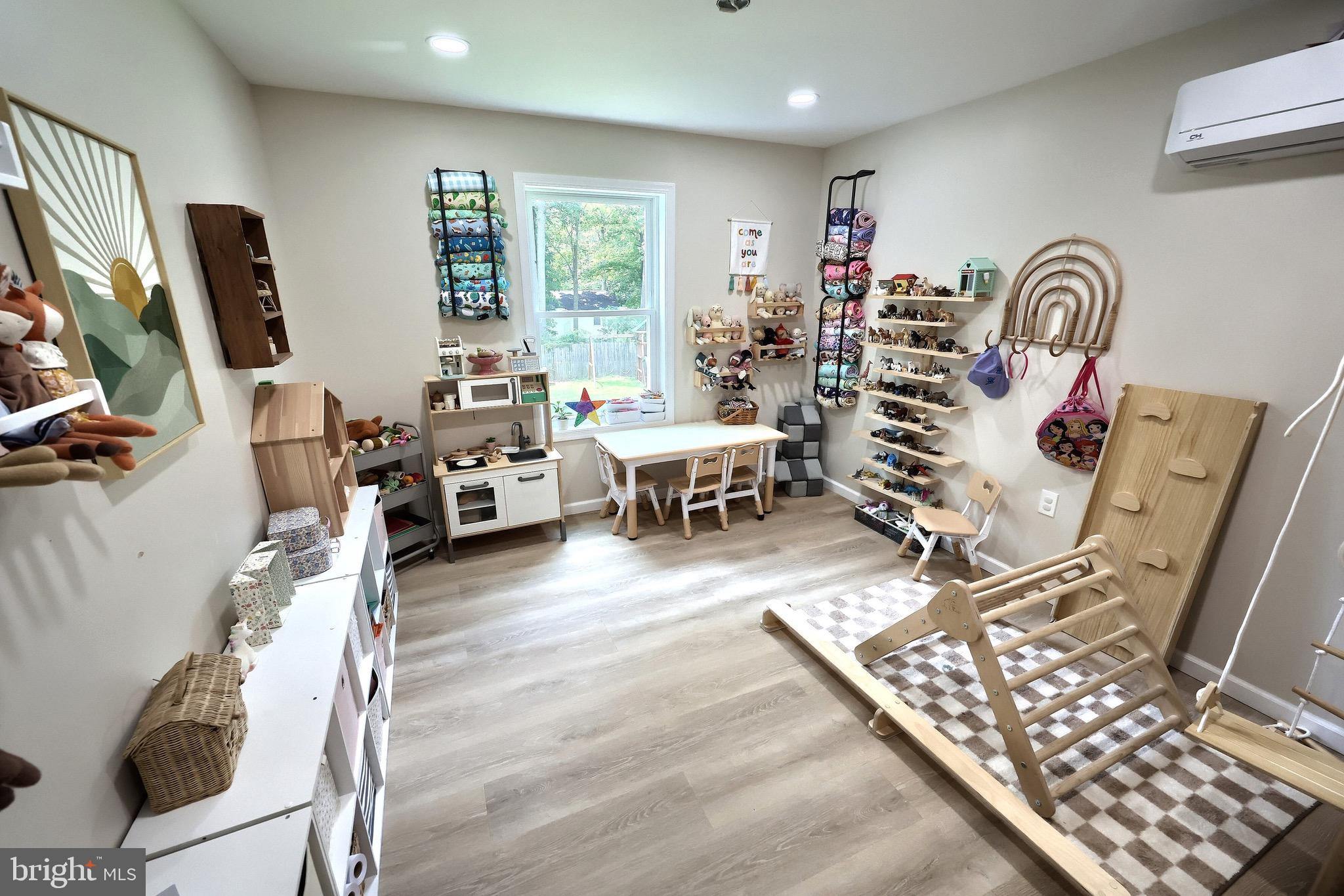 60 Massa Drive Windsor, PA 17366 - Photo 26 of 40 a living room with furniture a window and a flat screen tv