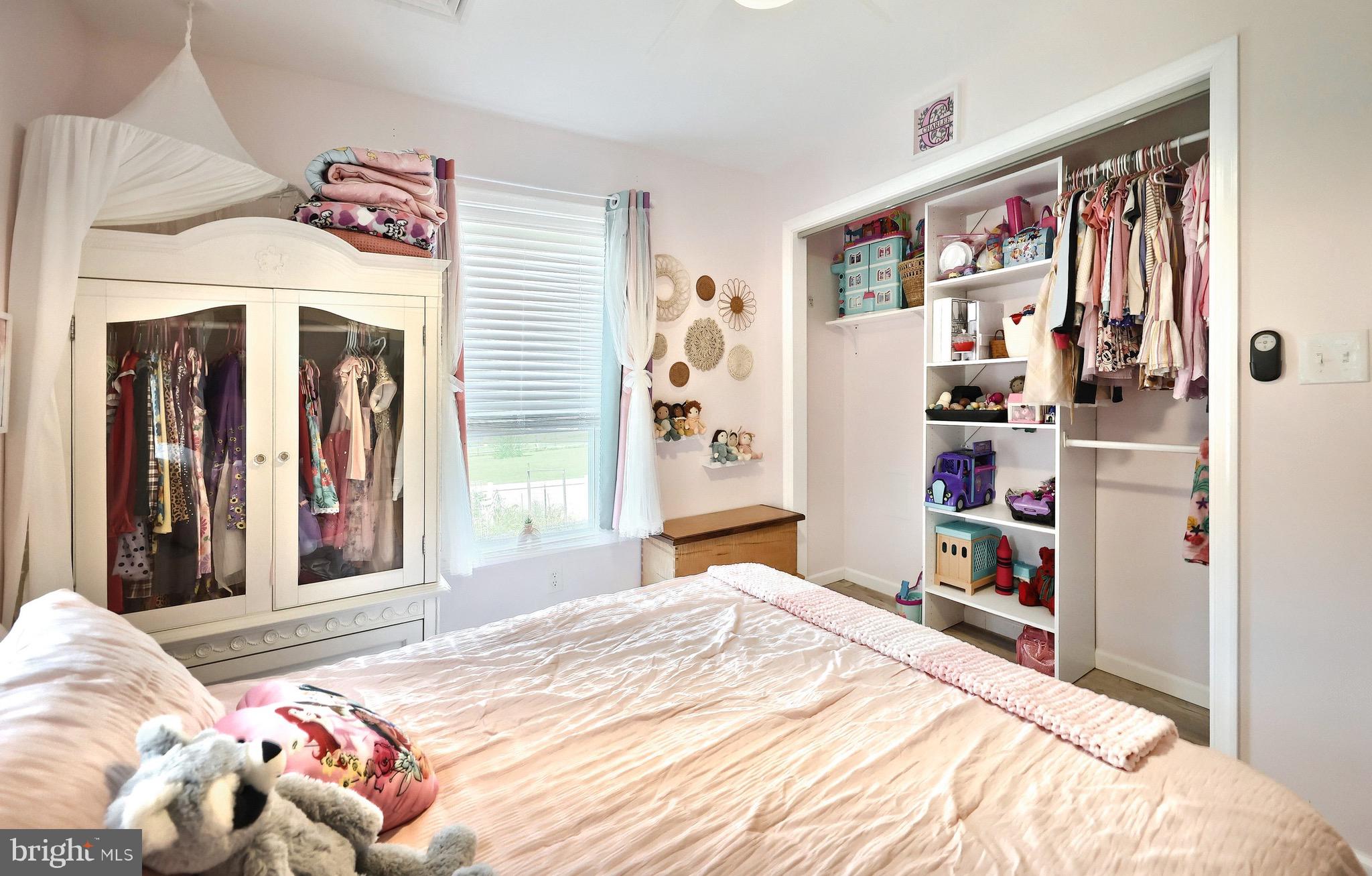 60 Massa Drive Windsor, PA 17366 - Photo 35 of 40 a bedroom with a bed and a large mirror