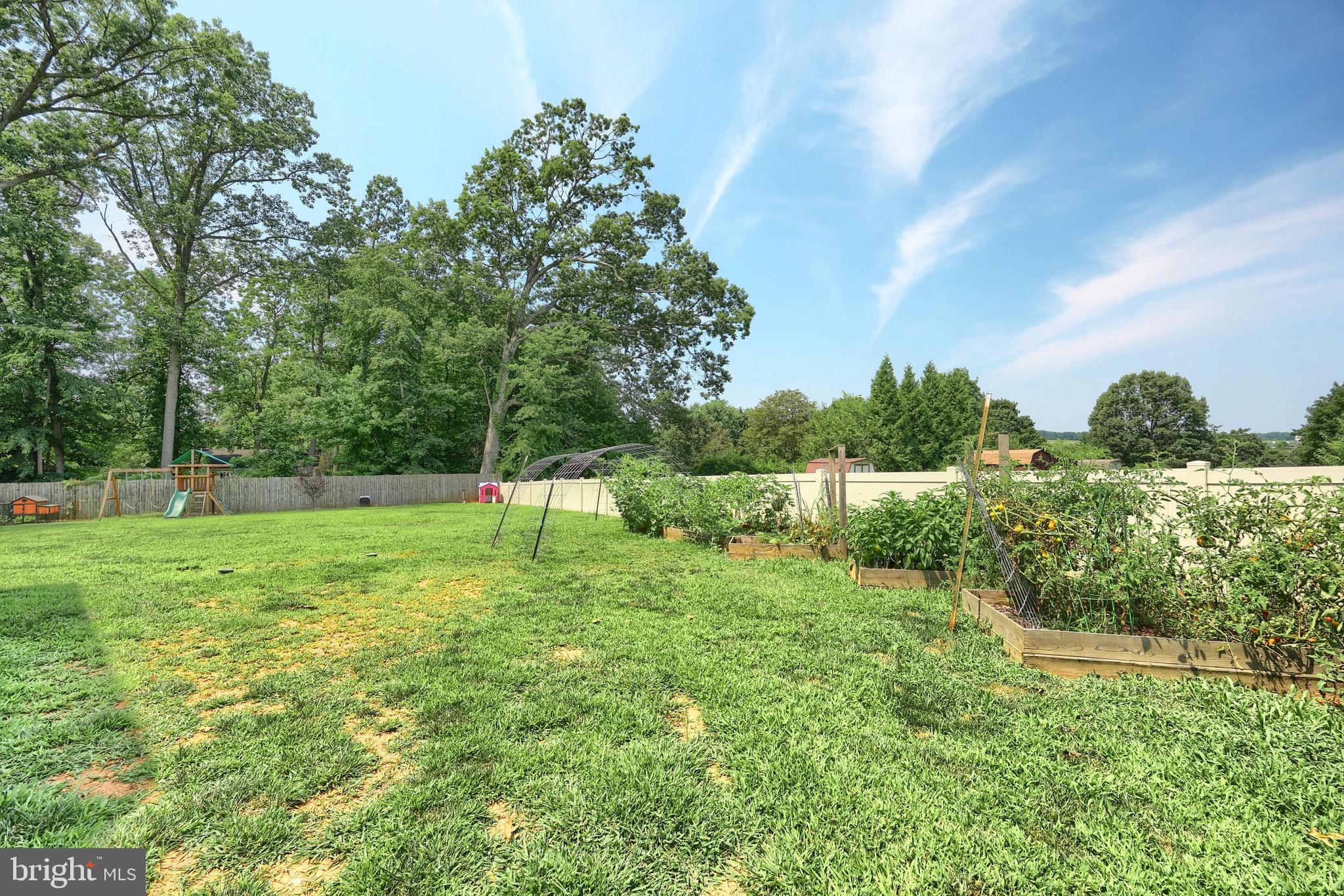 60 Massa Drive Windsor, PA 17366 - Photo 9 of 40 a view of a garden with a tree