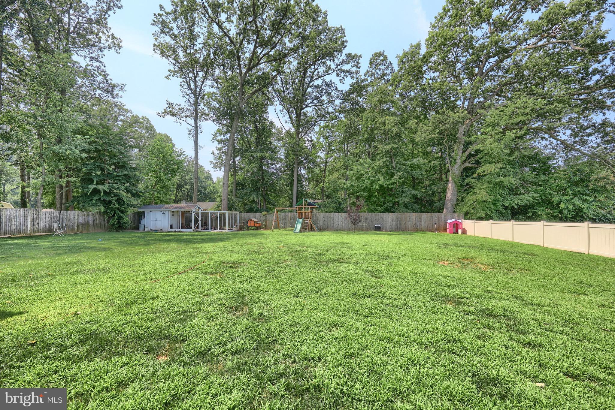 60 Massa Drive Windsor, PA 17366 - Photo 10 of 40 a view of a garden and basketball court