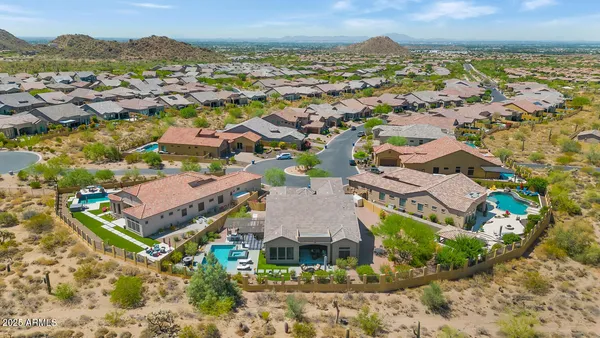 an aerial view of residential building with parking space