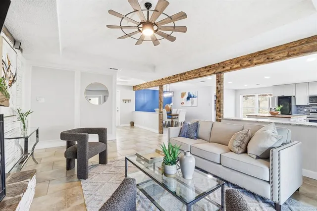 a lobby with furniture and window