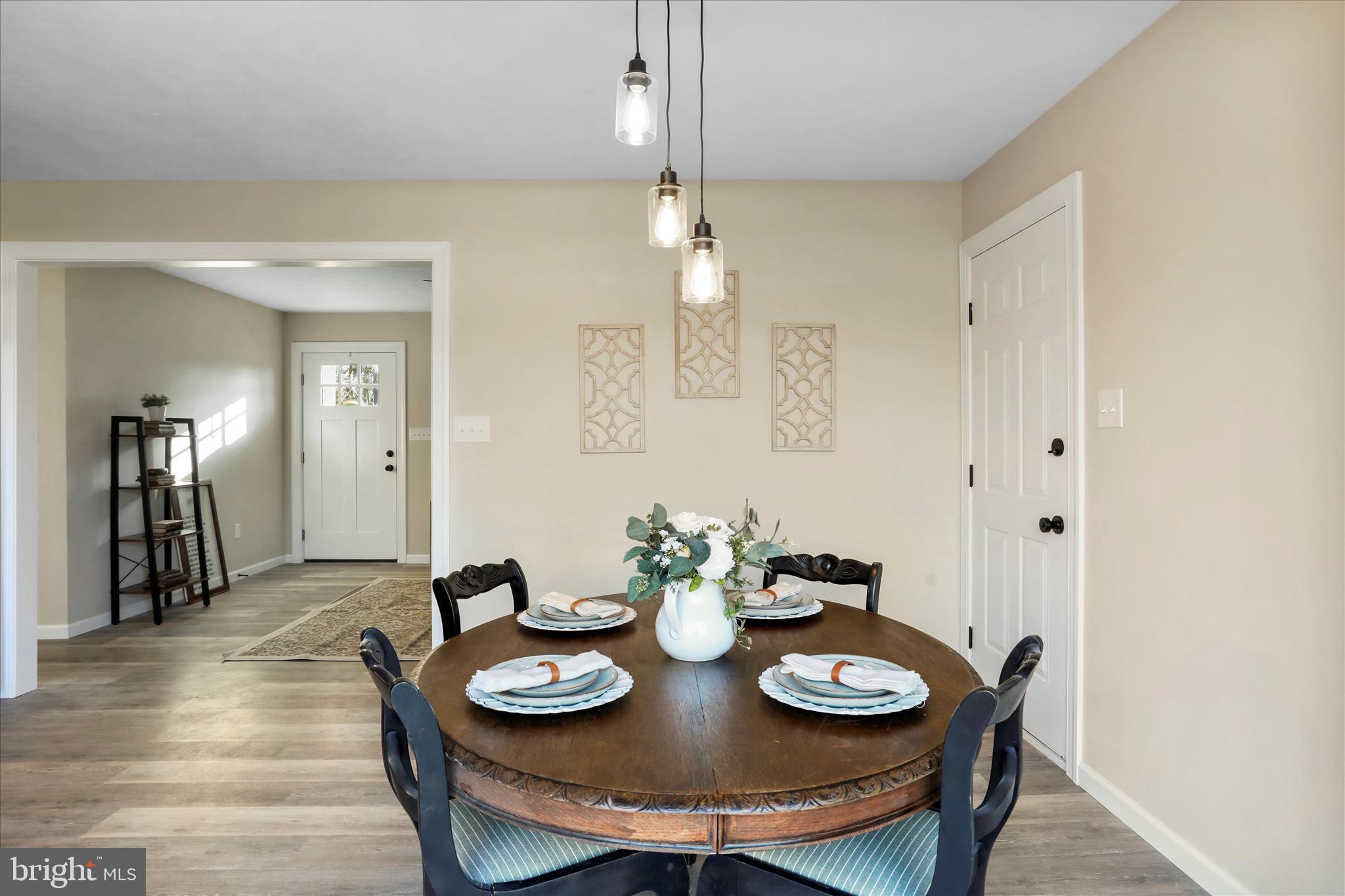 1517 Kendrick Ford Road Front Royal, VA 22630 - Photo 13 of 39 a view of a dining room with furniture and wooden floor