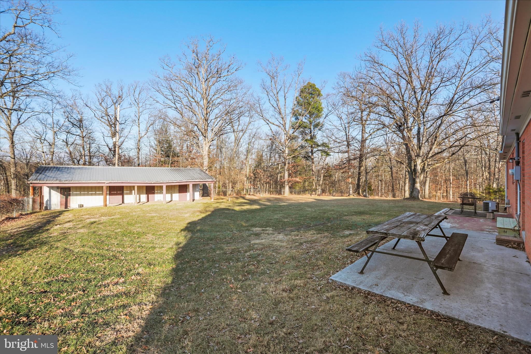 1517 Kendrick Ford Road Front Royal, VA 22630 - Photo 37 of 39 a view of a house with backyard and sitting area