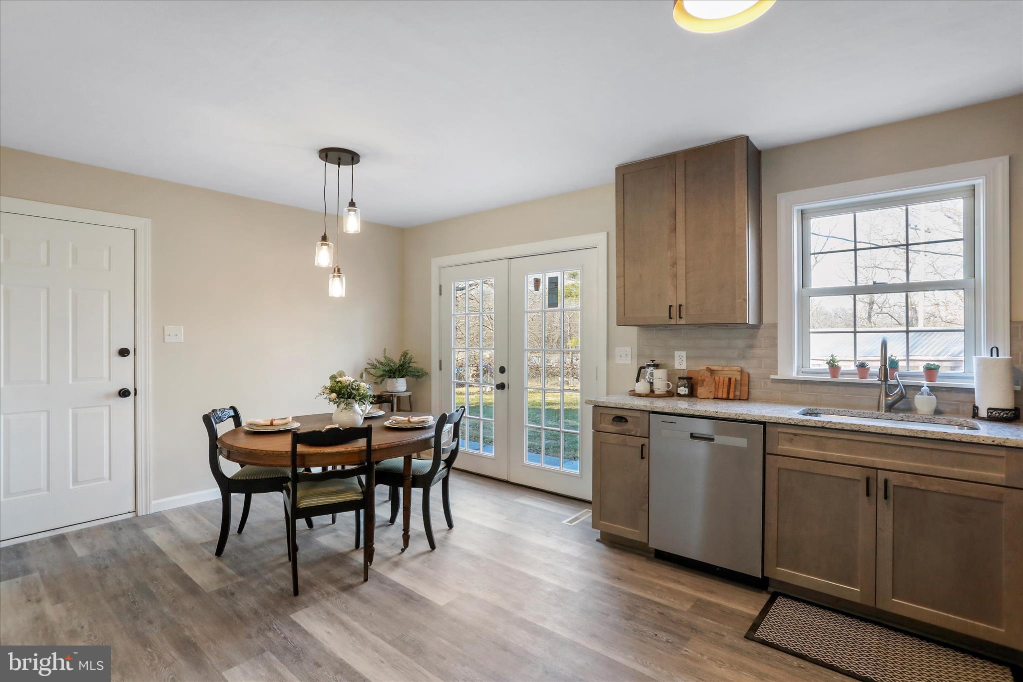 1517 Kendrick Ford Road Front Royal, VA 22630 - Photo 4 of 39 a view of a dining room with furniture and wooden floor