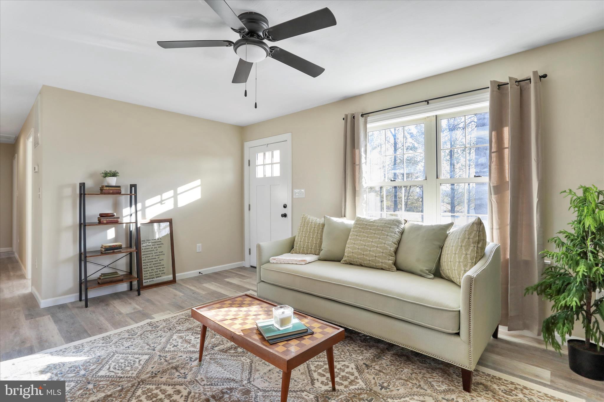 1517 Kendrick Ford Road Front Royal, VA 22630 - Photo 9 of 39 a living room with furniture and a large window