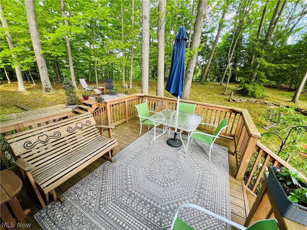 7220 Doty Road Madison, OH 44057 - Photo 18 of 50 Wooden balcony with a wooden deck
