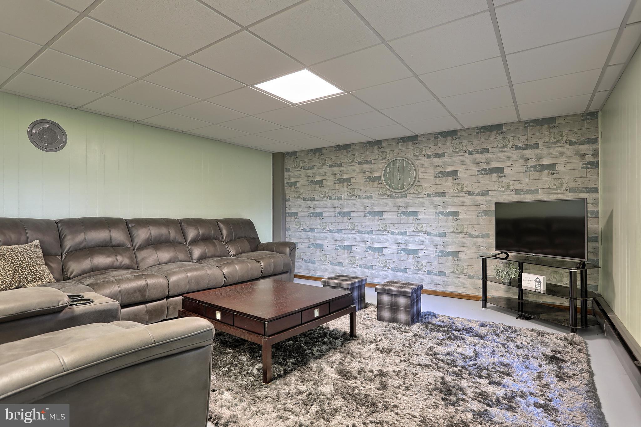 1418 Cornwall Road Lebanon, PA 17042 - Photo 5 of 36 Game Room in Daylight basement leads to patio