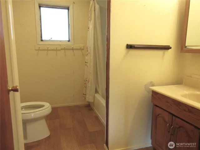 a close up of a bathtub curtain