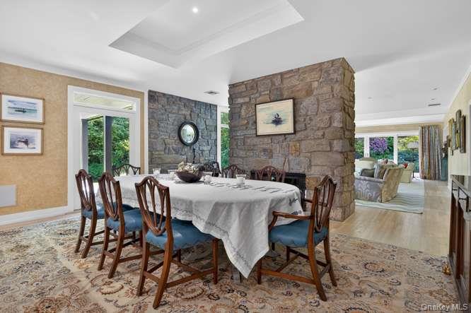 343 Chicken Valley Road Glen Head, NY 11545 - Photo 5 of 49 a view of a dining room with furniture window and wooden floor