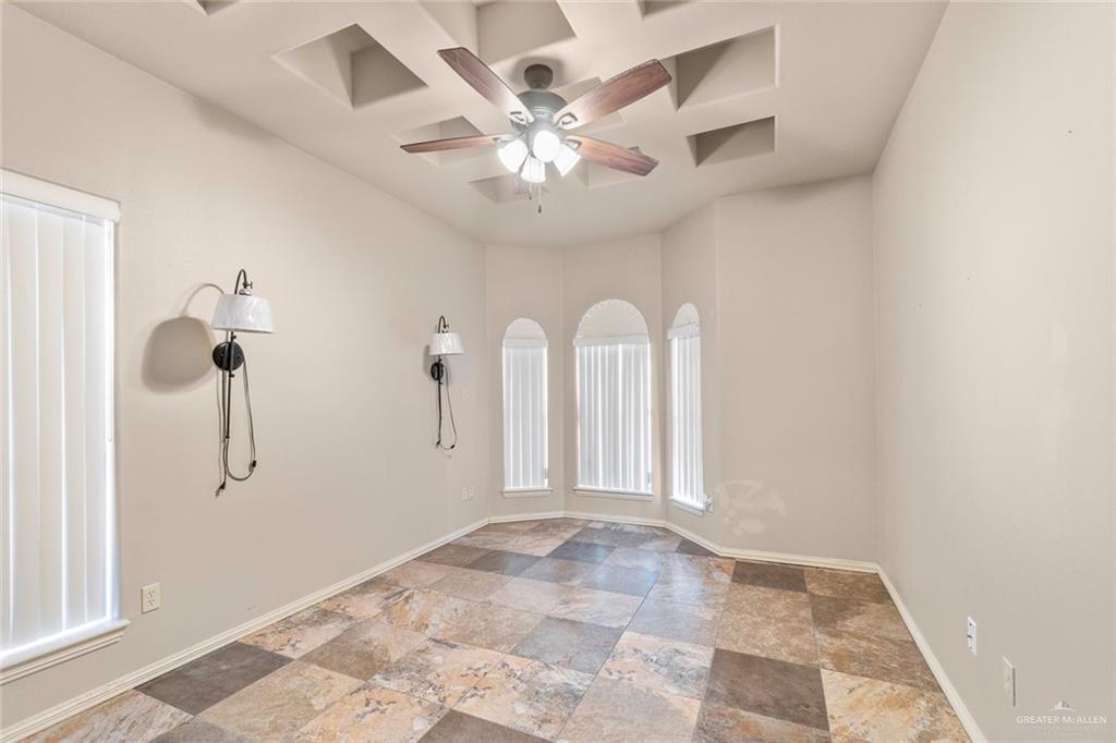 2904 Victoria Street Hidalgo, TX 78557 - Photo 15 of 25 Unfurnished room featuring ceiling fan and light stone finish floors