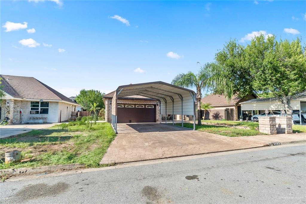2904 Victoria Street Hidalgo, TX 78557 - Photo 20 of 25 View of front of property with a garage