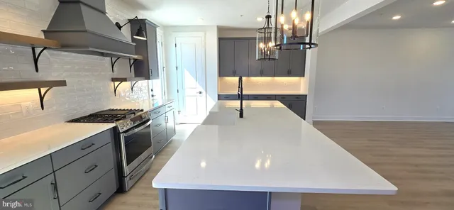 a view of a storage & utility room with a window