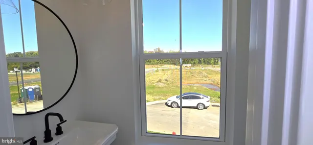 a view of livingroom with hardwood floor and window