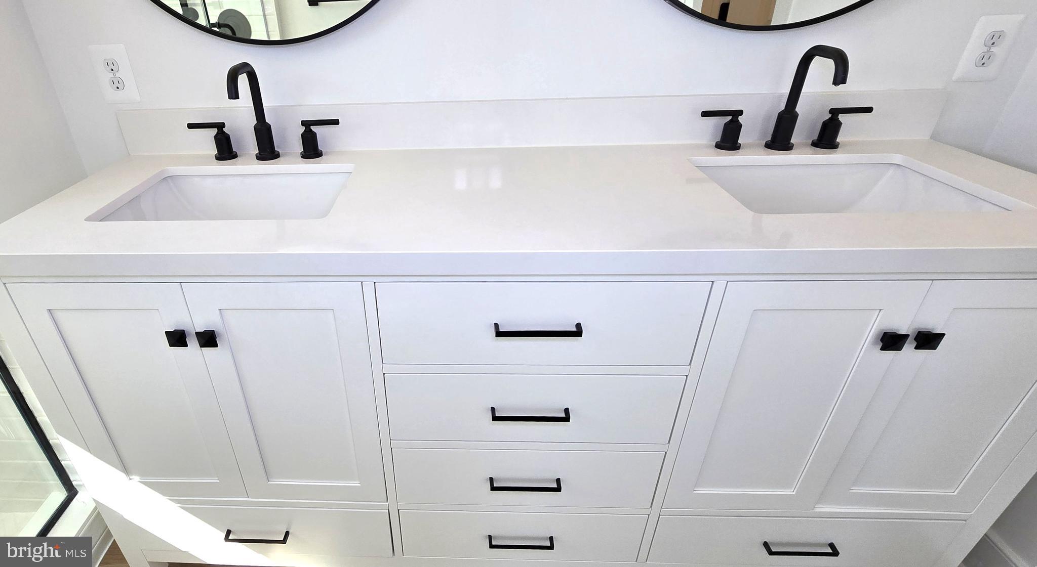 1726 Blacksmith Way Frederick, MD 21702 - Photo 44 of 64 a bathroom with a sink and a mirror